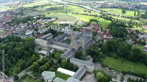 Aerial view, flight at Münsterschwarzach Benedictine Abbey in village Schwarzach, Lower Franconia, Bavaria, Germany photo