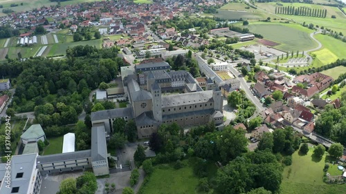 Aerial view, flight at Münsterschwarzach Benedictine Abbey in village Schwarzach, Lower Franconia, Bavaria, Germany photo