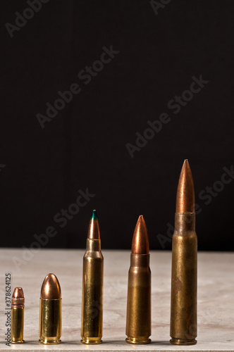 front view, close distance of a variety of ammunition, 22L, 9 mm, 5.6 mm, 7.62 mm, 8 mm Mauser photo