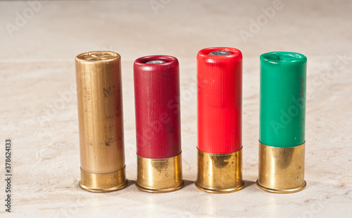 front view of a variety of twelve gage shot gun shells, both "00" and slugs, 