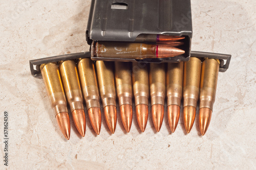 top view, close distance of 7.6 mm, rifle shells in a magazine and on strippers