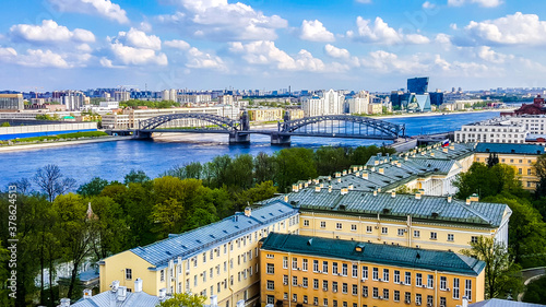 Bolsheokhtinsky Bridge  (Big Ohta bridge) across the Neva River in Saint Petersburg, Russia.View from the bell-tower of the Smolny Convent (Voskresensky).  photo