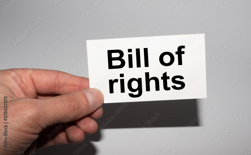 Message on the card BILL OF RIGHTS, in hands of businessman. Message on the card BILL OF RIGHTS, in hands of businessman.