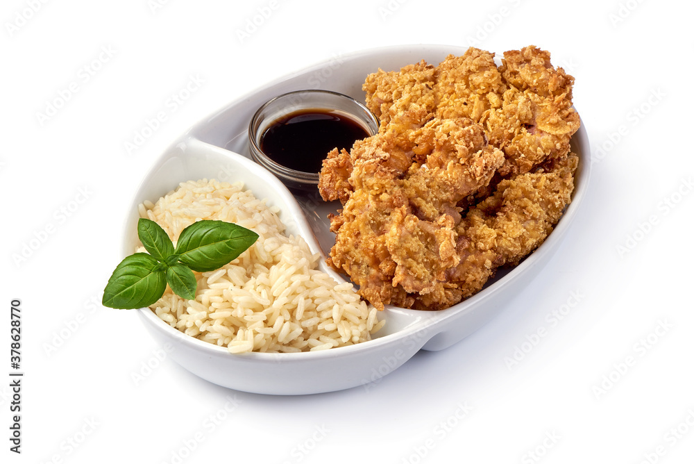 Fried chicken strips in breadcrumbs with rice, isolated on white background Fried chicken strips in breadcrumbs with rice, isolated on white background