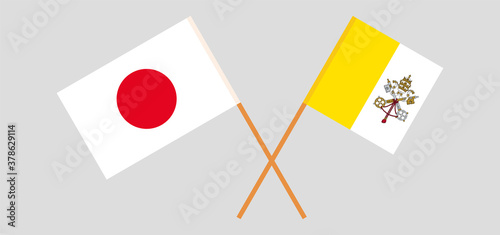 Crossed flags of Vatican and Japan