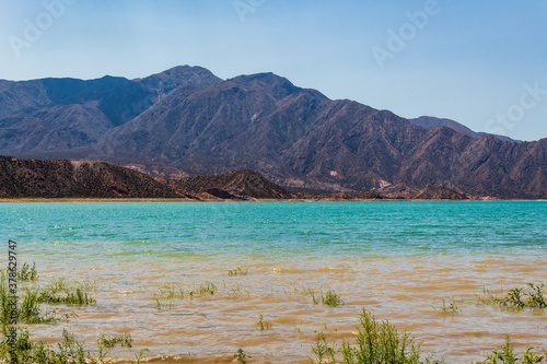 Wonderful Potrerillos Mountains in front of lake.