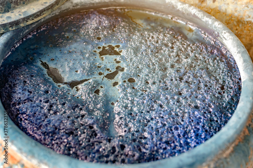 Indigo liquid in an indigo curing tank Ready for dyeing