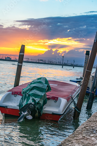 wonderful sunset with a boat in the foreground