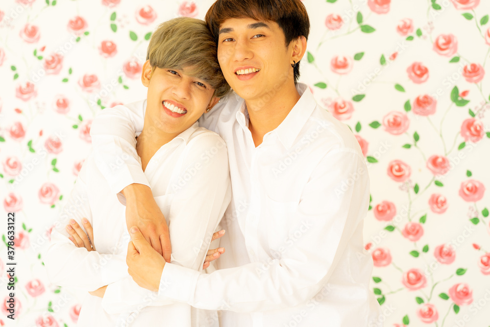 Asian couple lovers on white bed in bedroom holiday. family relationship love together concept. Asian couple lovers on white bed in bedroom holiday. family relationship love together concept.