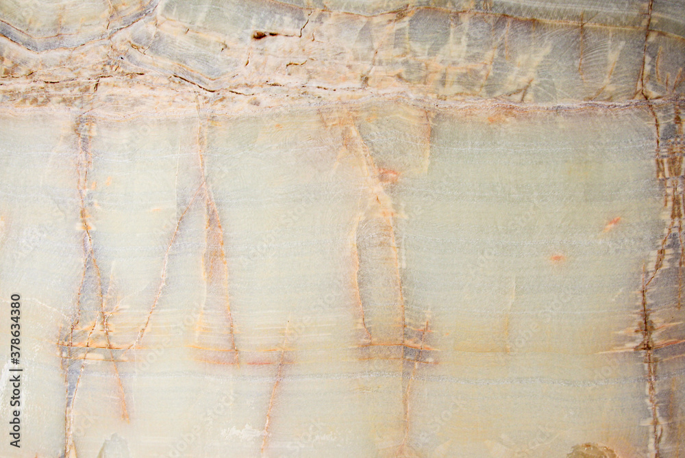 Naklejka premium close-up onyx slab cut-off background with textural relief and pattern