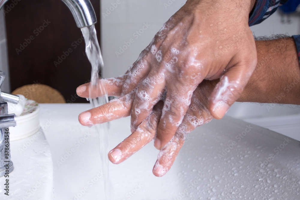 Fototapeta premium washing hands with soap