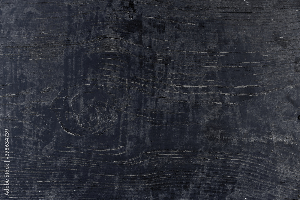 Obraz premium Black wooden desk surface texture for banner