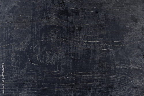 Black wooden desk surface texture for banner