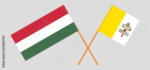 Crossed flags of Vatican and Hungary
