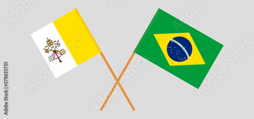 Crossed flags of Vatican and Brazil