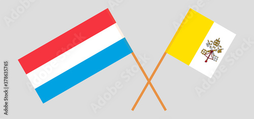 Crossed flags of Vatican and Luxembourg