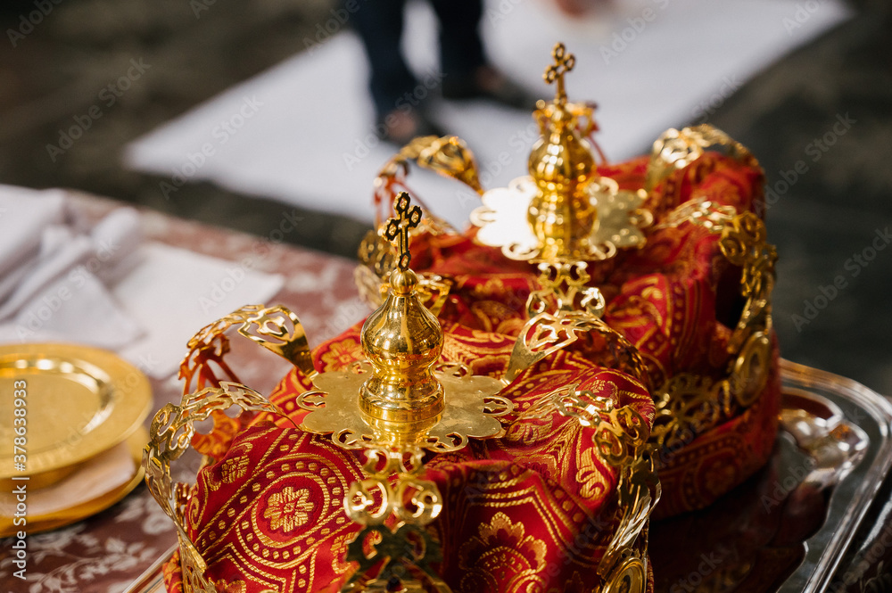 Fototapeta premium Two wedding crowns in church close up