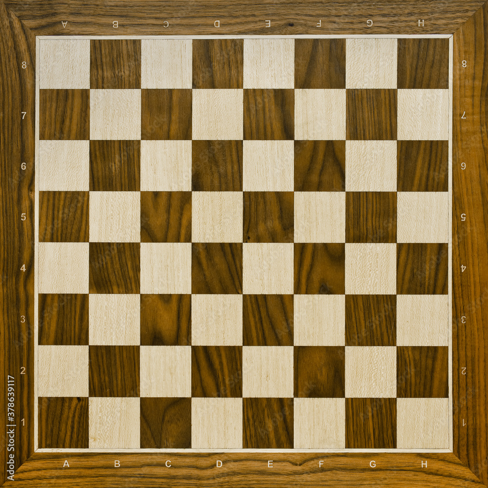 Top view on wooden chess board. Chess game.