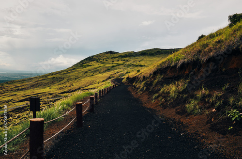 Wide shot of path from the top of Masaya volcano covered by volcanic sand photo