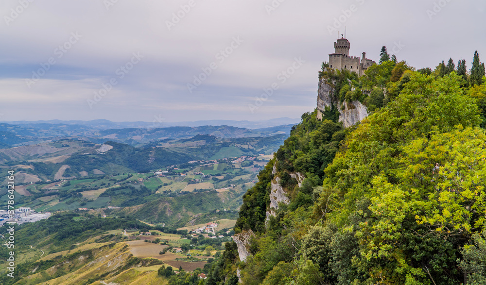 Panoramic view of San Marino with Cesta Tower and mountains