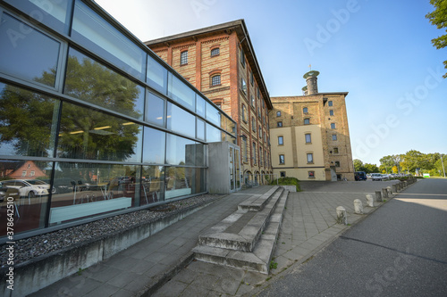 Historic malt factory in Grevesmuehlen, today the building of yellow bricks is an industrial monument and contains some offices of the district administration Northwest Mecklenburg, Germany