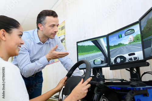 female student trying the drive simulator photo