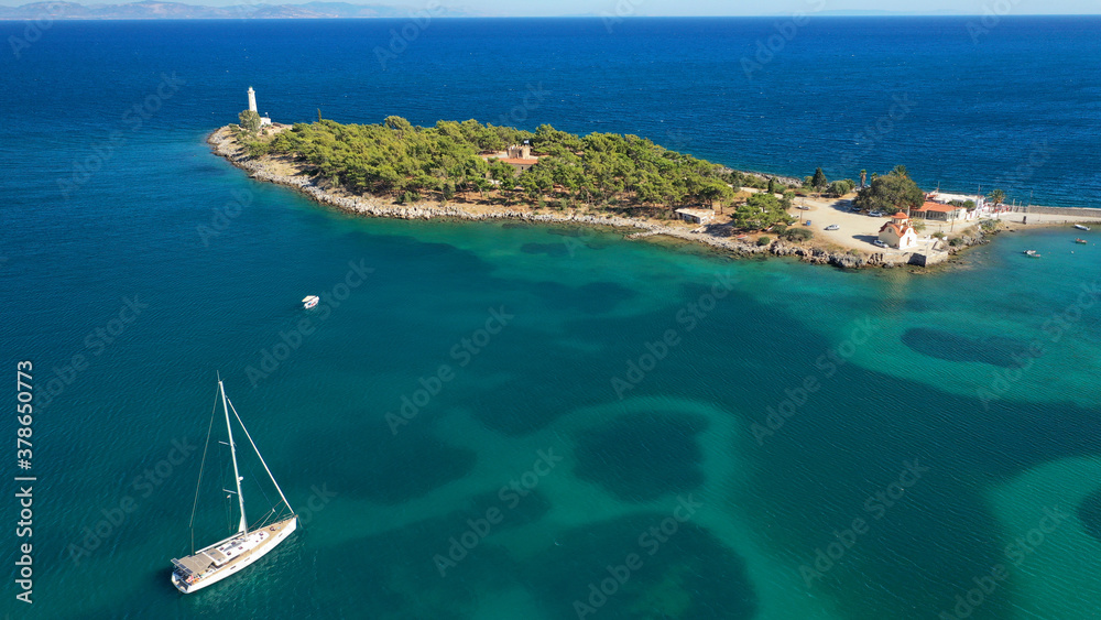 Aerial drone photo of famous small islet of Kranai known for old lighthouse and tower of Tzannetakis, Gytheio, Lakonia, Peloponnese, Greece