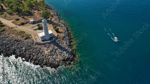 Aerial drone photo of famous small islet of Kranai known for old lighthouse and tower of Tzannetakis, Gytheio, Lakonia, Peloponnese, Greece photo