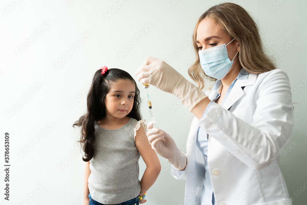 Preparing vaccine for little girl
