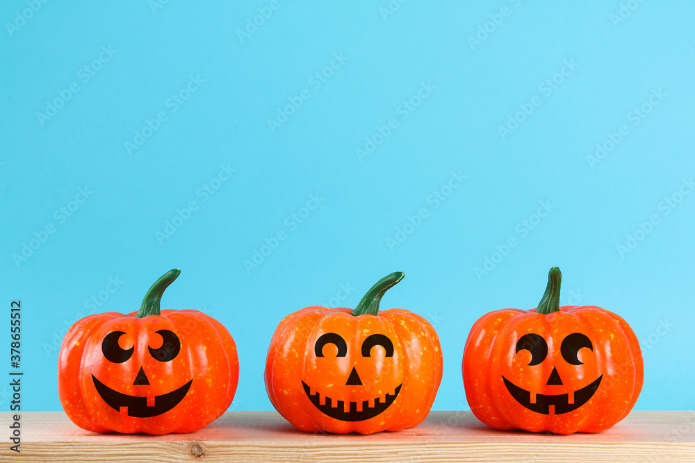 Halloween holiday concept with pumpkin decor on wooden table. Halloween holiday concept with pumpkin decor on wooden table.
