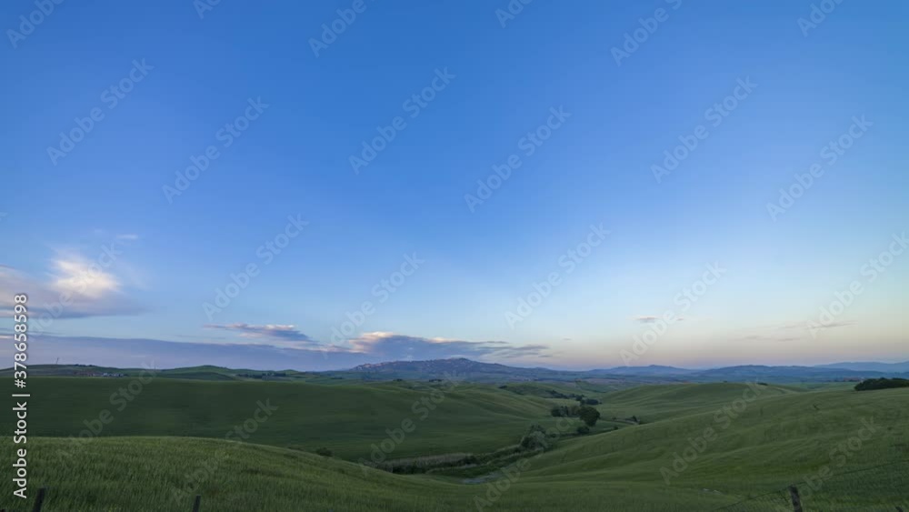 Sunset in Tuscany countryside with Volterra in the distance timelapse 4K Sunset in Tuscany countryside with Volterra in the distance timelapse 4K