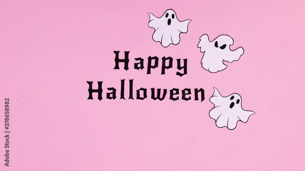 Happy Halloween text and ghosts fly around text .Stop motion Happy Halloween text and ghosts fly around text .Stop motion