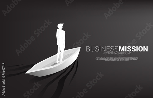 Silhouette of businessman on boat moving forward. Business Concept of leadership and vision mission.