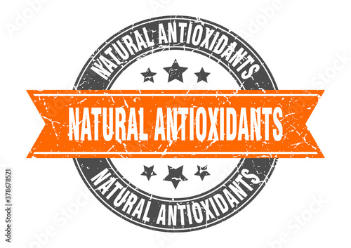 natural antioxidants round stamp with ribbon. label sign
