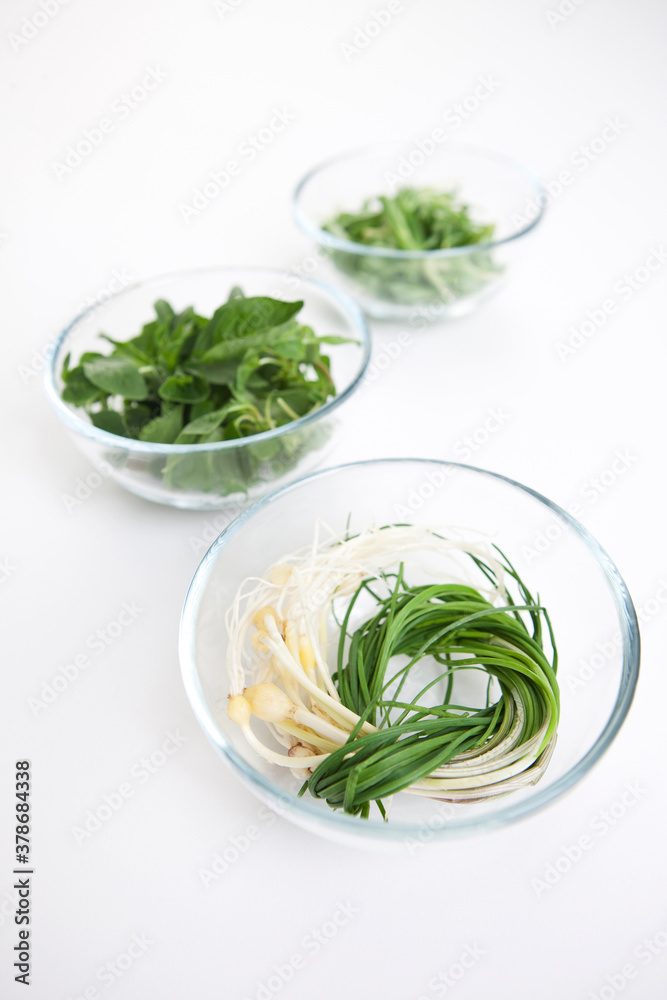 spring vegetables on white background spring vegetables on white background