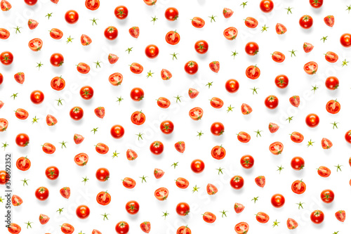Fototapeta Naklejka Na Ścianę i Meble -  creative background from red tomatoes. Abstract background. of isolated ripe Tomato on the white background not seamless pattern