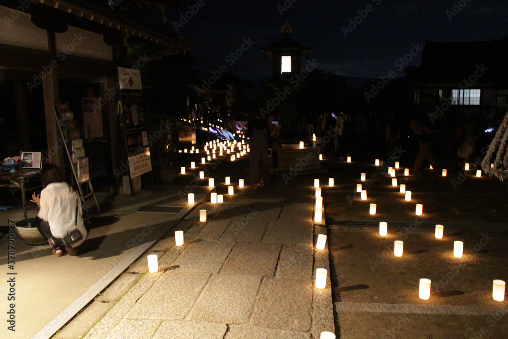 Line of candles inside Okadera Temple during lantern festival in Asuka