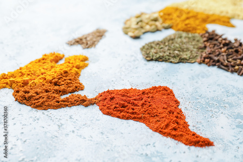 Fototapeta Naklejka Na Ścianę i Meble -  World map made of different spices on light background