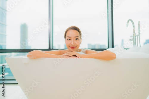 Portrait beautiful young asian woman relax smile leisure in bathtub
