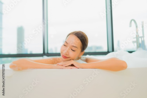 Portrait beautiful young asian woman relax smile leisure in bathtub