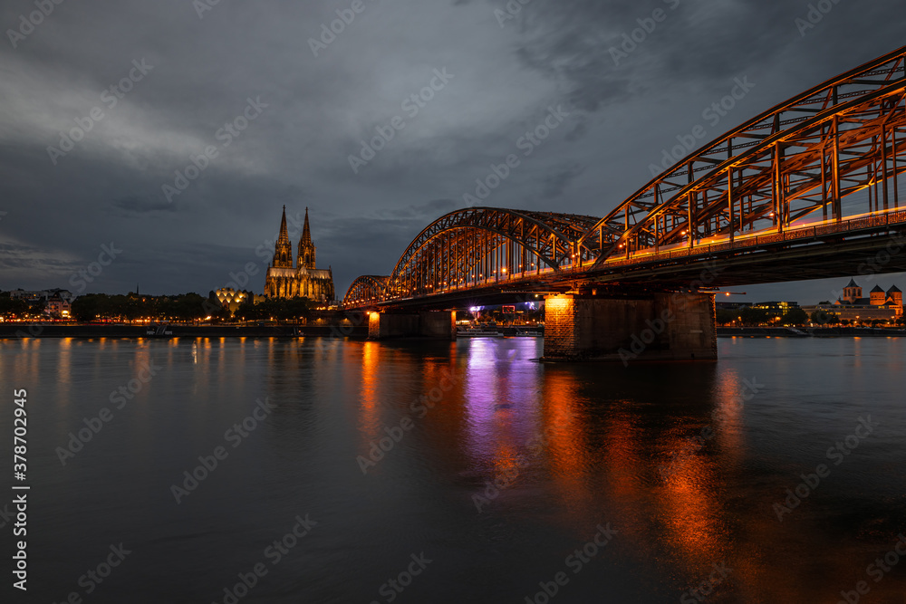 Fototapeta premium View of Cologne with the famous railways bridge and Cologne Dom behind