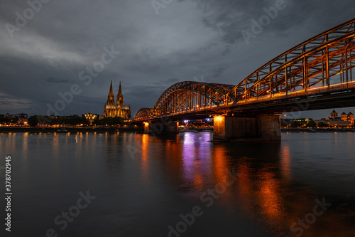 View of Cologne with the famous railways bridge and Cologne Dom behind
