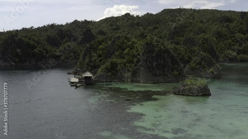 Raja Ampat, Geosite Piaynemo, Slow Pan of lagoon and Fly-over of rocky islands