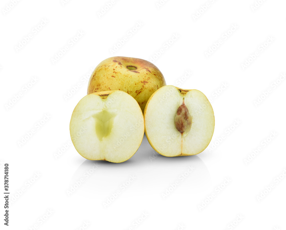 Half with chinese jujubes isolated on white background Half with chinese jujubes isolated on white background
