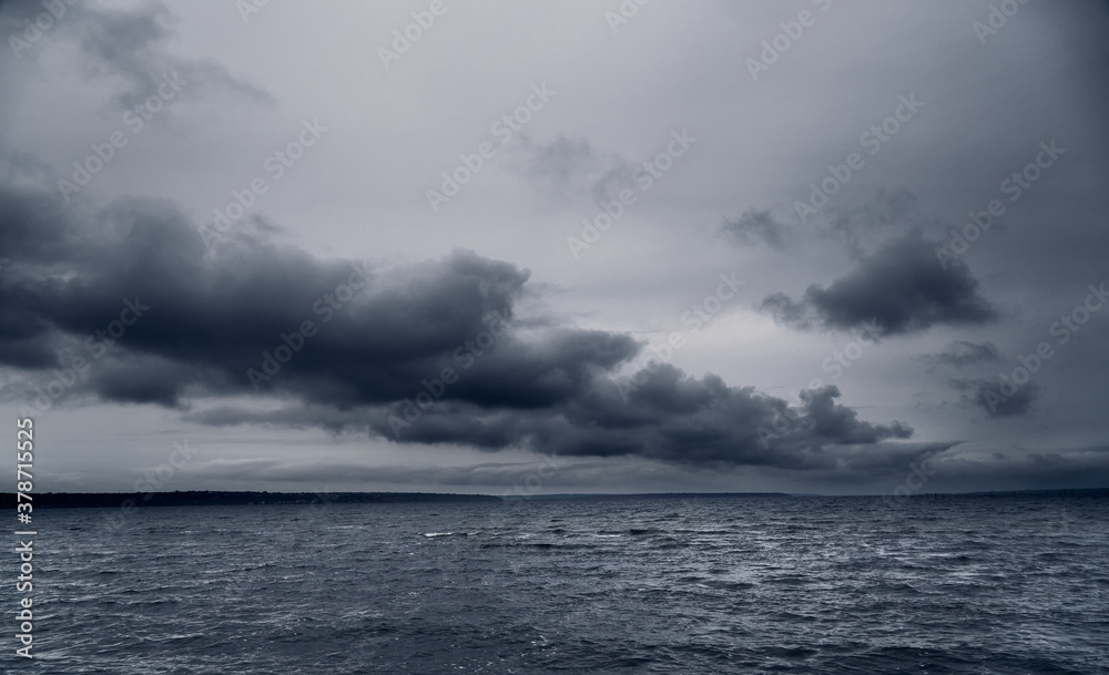 dark stormy sea and dramatic clouds, gloomy nature