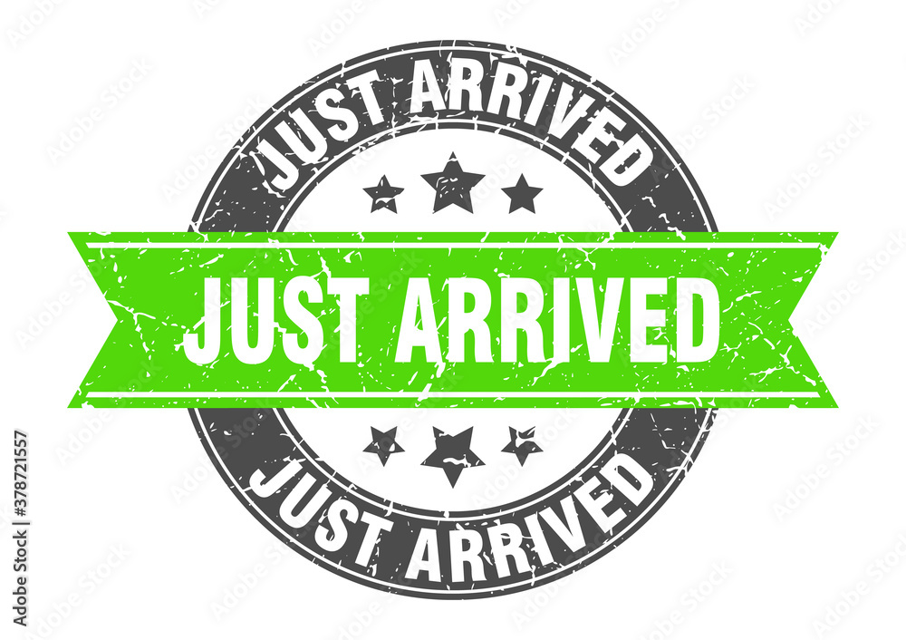 Obraz premium just arrived round stamp with ribbon. label sign