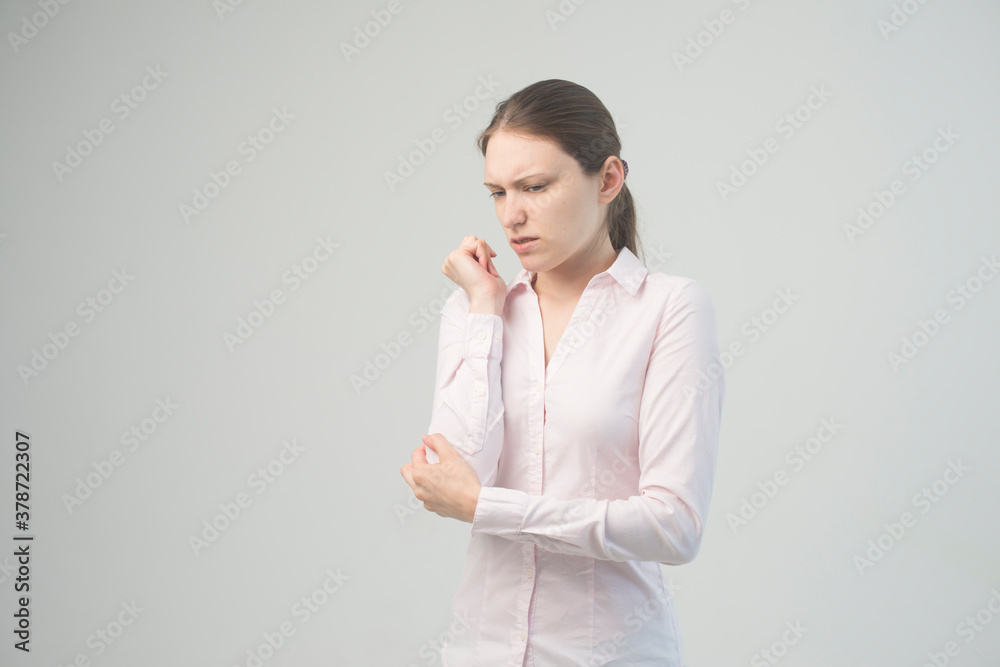 Tired woman feeling pain, massaging tense muscles Tired woman feeling pain, massaging tense muscles