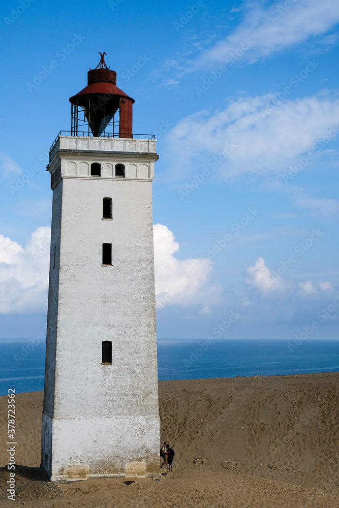 Famous Rubjerg Knude Fyr on the Dune Cliff of the northern Jutland, Denmark, Europe