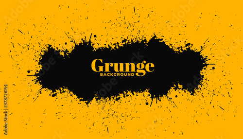 yellow backgorund with black grunge splatter