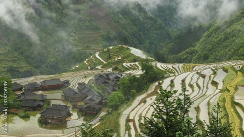 Village and Terraced Rice Field in the Fog